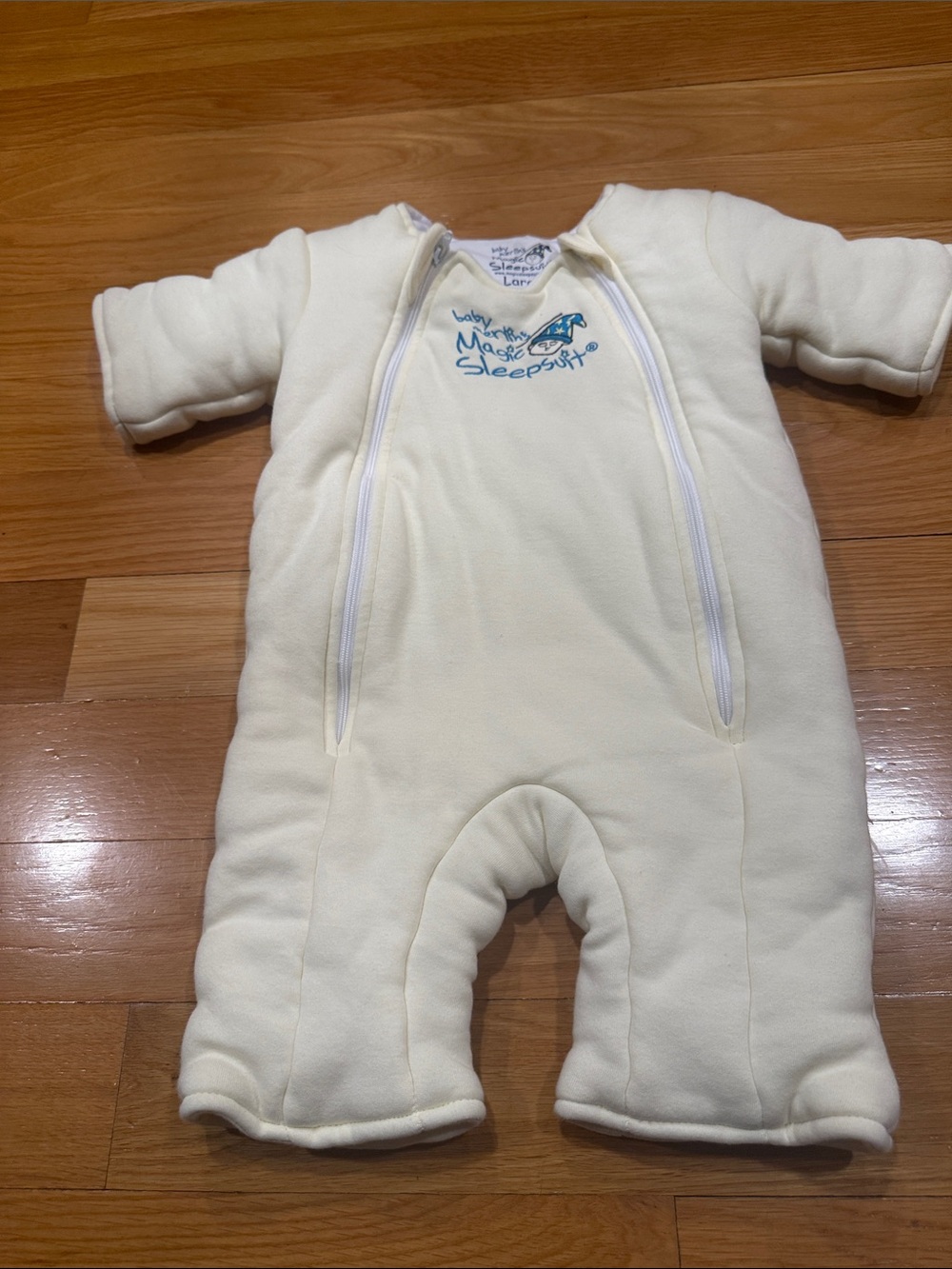 Baby Merlin’s magic sleepsuit yellow size large (6-9 months ).